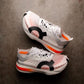 ON CLOUDBOOM STRIKE WHITE ORANGE