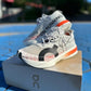 ON CLOUDBOOM STRIKE WHITE ORANGE